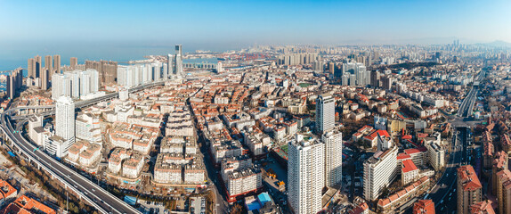 Obraz premium Aerial Panorama of Coastal Urban Cityscape