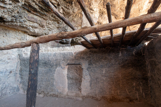 Ancient Cliff Dwelling Interior with Wooden Roof Beams.