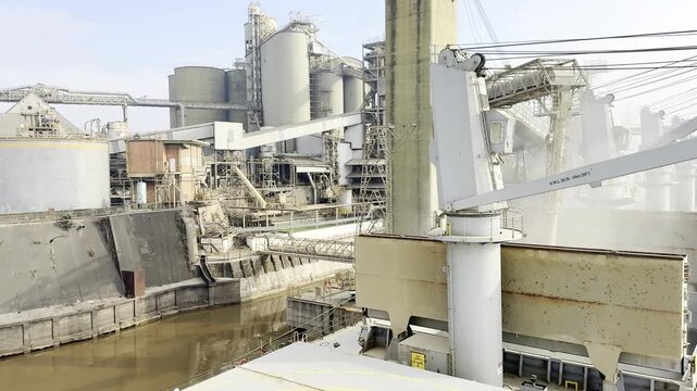 loading wheat to ship silo cargo operation.