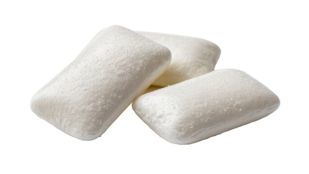 Three white rectangular chewing gum pieces, isolated on transparent background