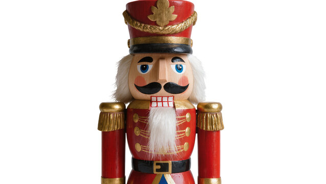 Traditional wooden nutcracker soldier with red uniform and gold trim, isolated on transparent background