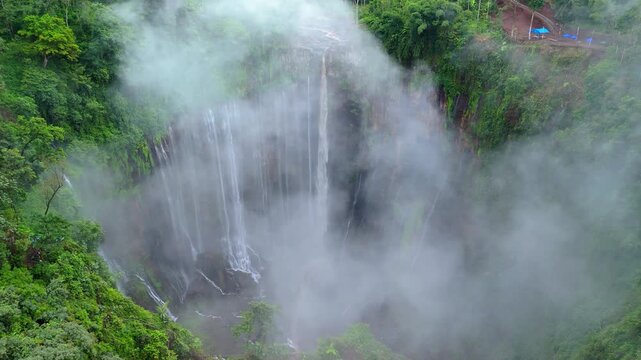 Tumpak Sewu Waterfall in a Dramatic Cloudy Landscape | Java Island Indonesia Nature Wonder