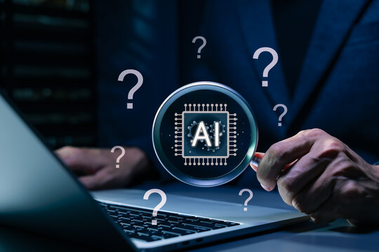 AI question analysis and artificial intelligence research concept. Person using laptop with magnifying glass, AI chip and question marks showing data discovery, problem solving, smart decision support
