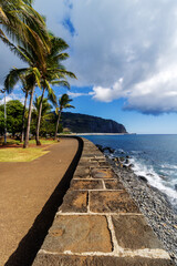 Fototapeta premium Volcanic stone wall on Indian Ocean coast - Barachois in Reunion island