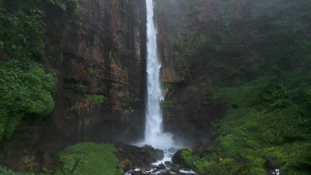 Aerial Drone View of Kapas Biru Waterfall &ndash; Java Island Indonesia Tropical Rainforest Landscape