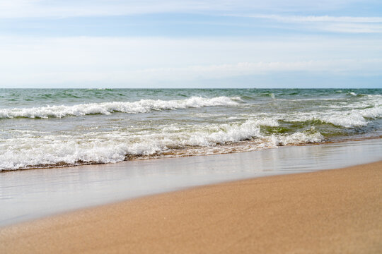 Lake Michigan Sandy Beach Shoreline with Waves and Sky