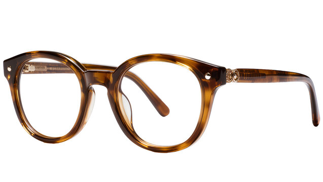 Tortoiseshell patterned eyeglasses with gold accents, isolated on transparent background