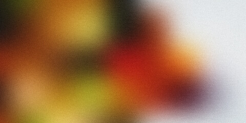 Obraz premium Vibrant abstract blend of red, orange, yellow, and green with grainy texture keywords: abstract