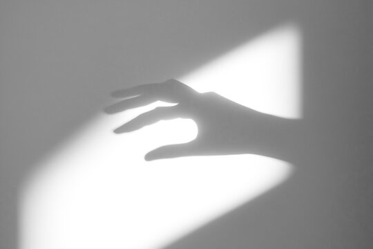 hand shadow on wall background,hand with shadow,hands shadow overlay effects,silhouette of hands,halloween background with Terrifying scary hands