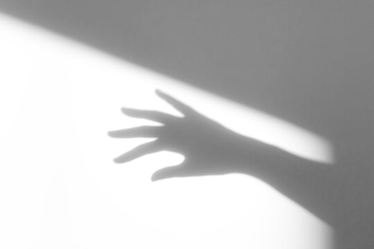 hand shadow on wall background,hand with shadow,hands shadow overlay effects,silhouette of hands,halloween background with Terrifying scary hands