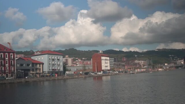 Bilbao city skyline with nervion river waterfront view