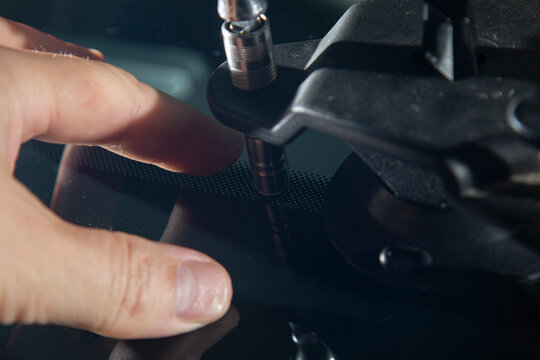 Repair of chips and cracks on car windows. Repair of windshields