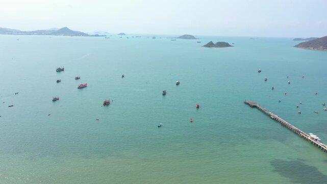Aerial footage of Sattahip district located in Chomburi province.