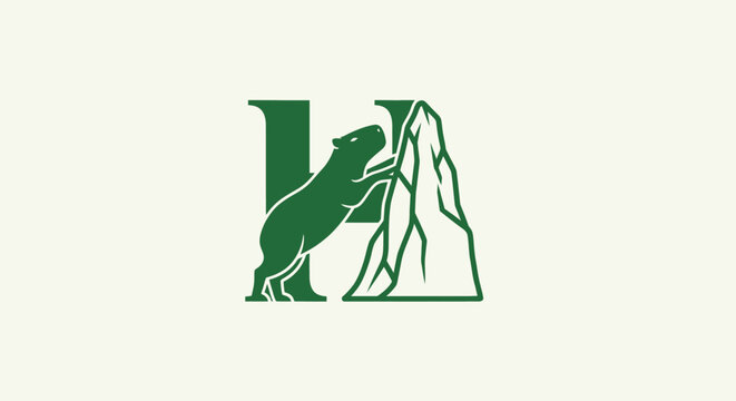 Green lizard logo with mountain and letter design.