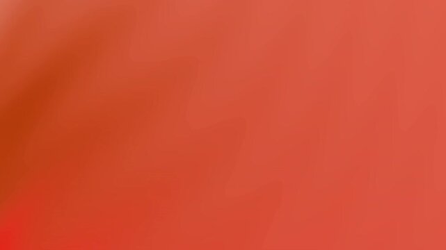 Abstract red background presents a smooth gradient texture that is suitable for modern design projects.
