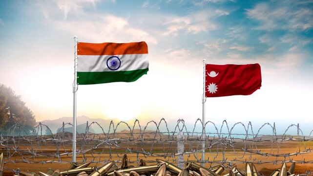 India and Nepal flags waving over a barbed wire border with bullet casings