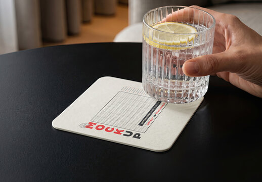 Coaster with Drink and Hand Mockup