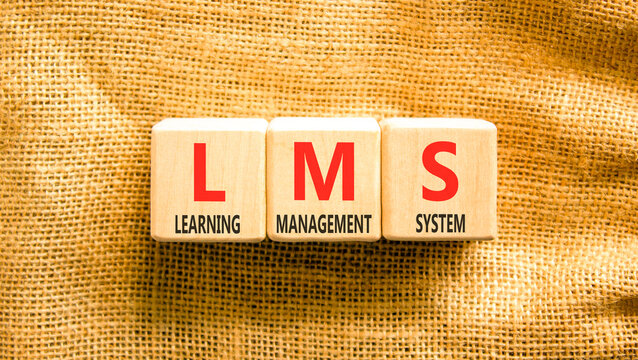 LMS learning management system symbol. Concept words LMS learning management system on beautiful wooden blocks. Beautiful canvas background. Business LMS learning management system concept. Copy space