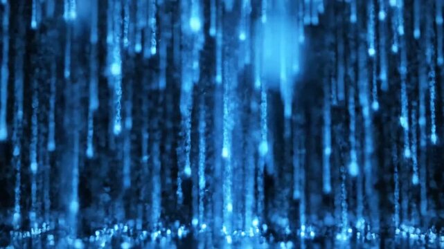 Blue digital data rain falling on black background