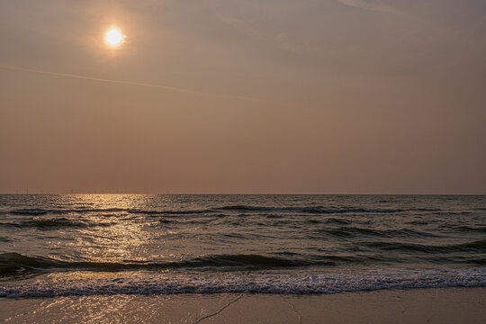 Beautiful sunset over the North Sea at the beach of Egmond aan Zee.