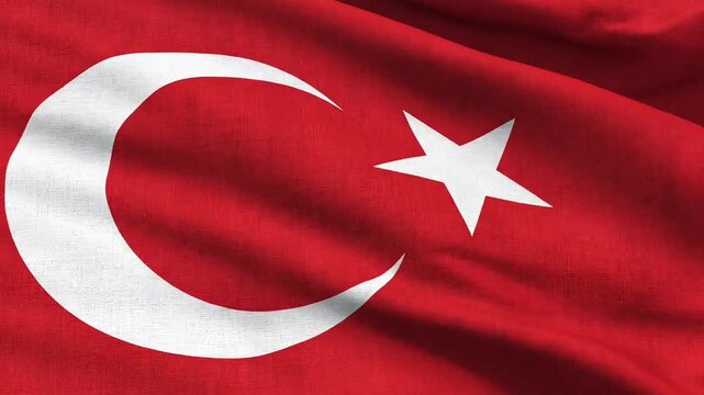 Waving Turkish flag with crescent moon and star, a symbol of national pride.