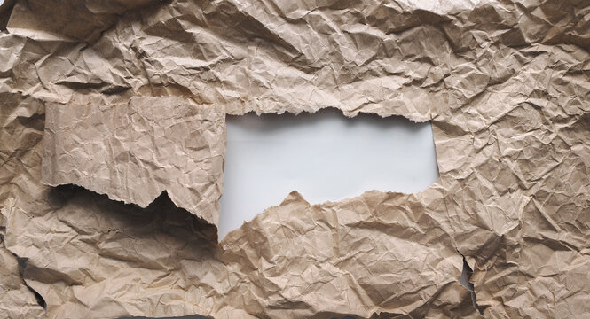 Background from crumpled light brown wrapping vintage paper.