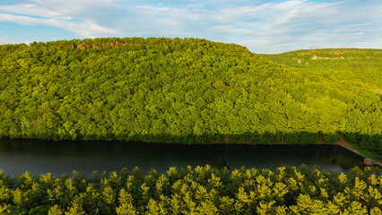 Fototapeta premium Summer aerial view featuring the Bradley Hubbard Reservoir at Doctor Francis Giuffrida Park and Chauncey Peak in Meriden, Connecticut