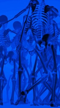 seamless vertical video of skeletons with a sensual dance. Funny halloween background.