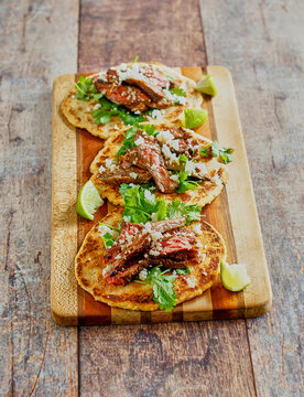 carne asada tacos with fresh lime and cilantro