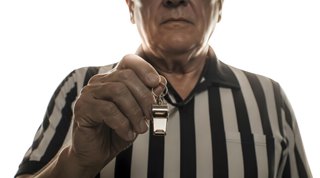 Referee Holding a Shiny Metal Whistle Ready to Signal a Game Stop
