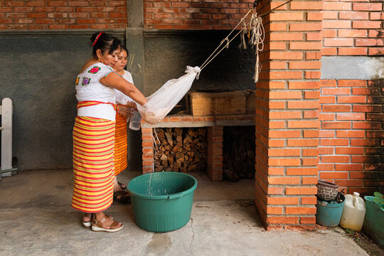 Women Preparing Traditional drink