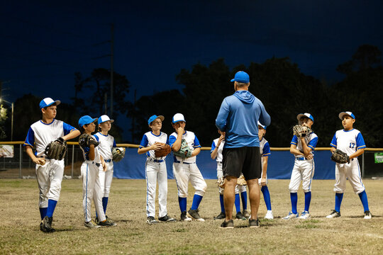 Coach Talks During Baseball Practice