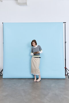 Studio fashion portrait Woman Blue Background