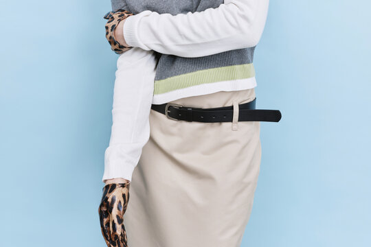 Anonymous woman pastel color outfit fashion detail