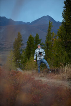 A male tourist in the forest