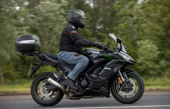 Stony Stratford,Bucks,UK - June 7th 2026:  Man riding a 2025 Kawasaki Ninja zx 1100  motorcycle driving on a British road
