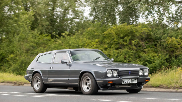 Stony Stratford,Bucks,UK - June 7th 2026: 1990 Reliant Middlebridge Scimitar car driving on a British road