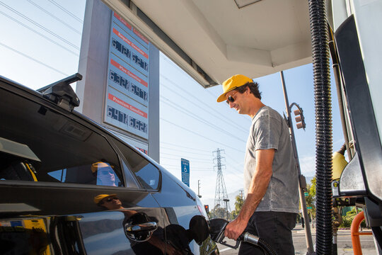 Man Paying High Prices for Gas