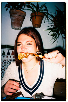 Woman Eating Crab Leg 