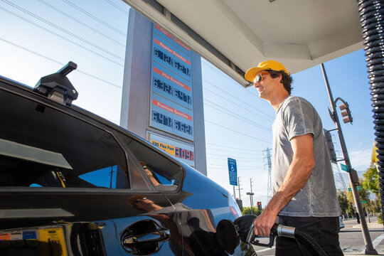 Man Paying High Prices for Gas