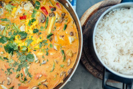 Colorful vegetable curry served with rice from above