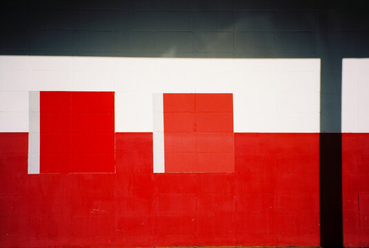 Red and White Painted Wall with Shadow