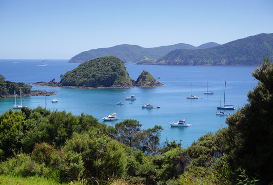 Boats at anchor in a pristine bay in summer
