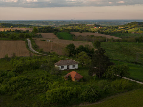 Traditional Serbian Countryside House Among Rolling Hills