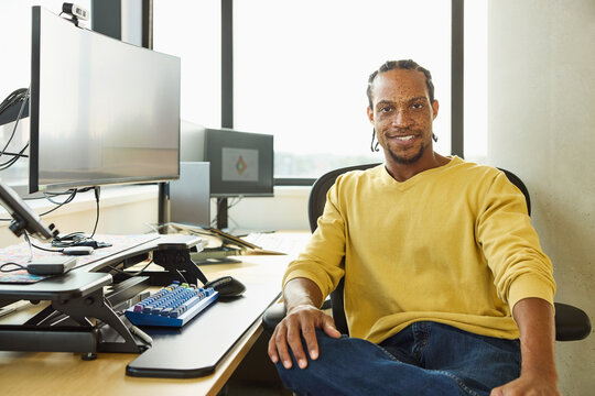 BusinessMan Sitting in an Office