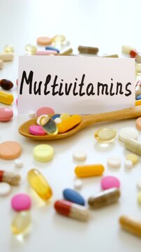 Various tablets and capsules, supplements and vitamins. Selective focus.