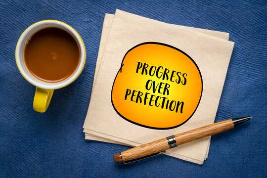 progress over perfection inspirational note, productivity and personal development concept