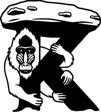 Mandril monkey holding large stone letter K.