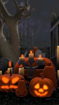 vertical video of pumpkins and candles in a cemetery at night. Halloween background. Camera scroll