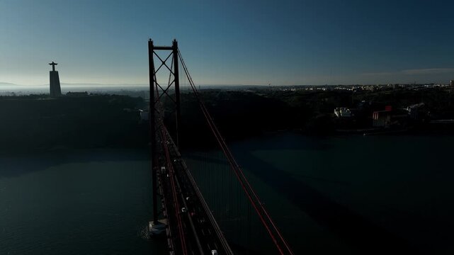 25 de Abril Bridge Cinematic Drone Footage Above the Tagus River in Summer. Lisbon Portugal